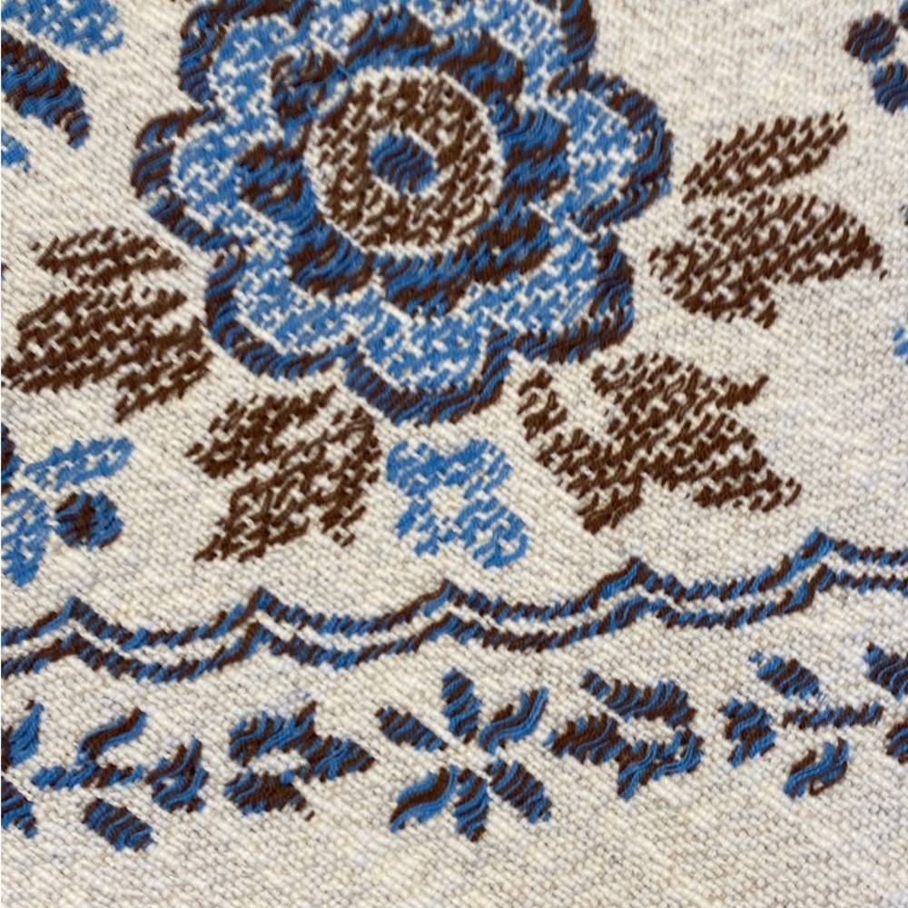 Round lace trimmed table cover